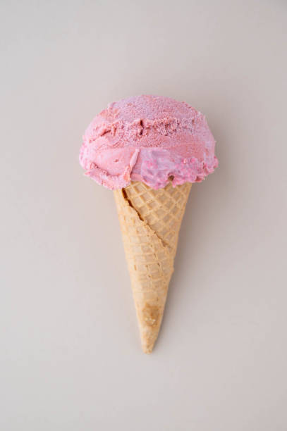 istock strawberry ice cream on colorful background 1256727900