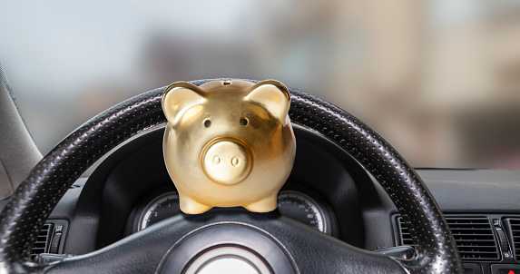 Steering wheel with piggy bank