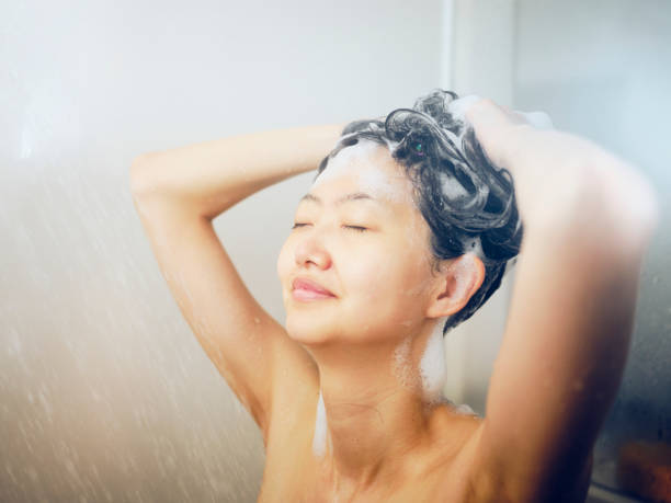 istock Japanese Woman Taking a Shower 1256730183