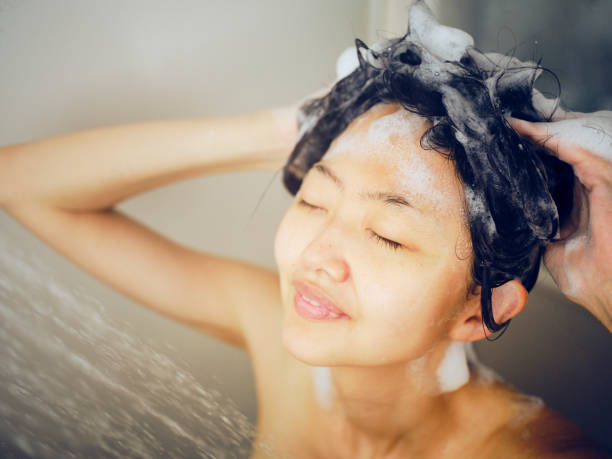 istock Japanese Woman Taking a Shower 1256730205