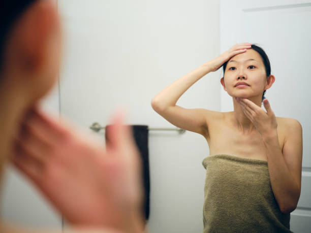 istock Japanese Woman Getting Ready in a Bathroom 1256730268