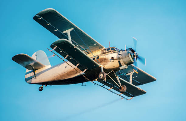 istock Old airplane biplane spraying mosquitoes 1256731666