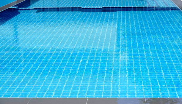 istock Outdoor Swimming pool background 1256731970