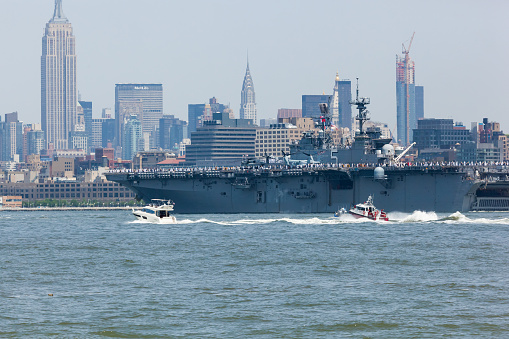 MAY 25, 2016 - Jersey City, NJ:  The USS Bataan Aircraft Carrier travels the Hudson River between Jersey City and Manhattan during the Parade of Ships for Fleet Week, 2016.