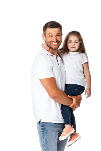 cheerful father holding in arms cute daughter isolated on white