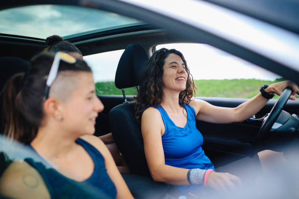 istock Female runners on a road trip 1256741198
