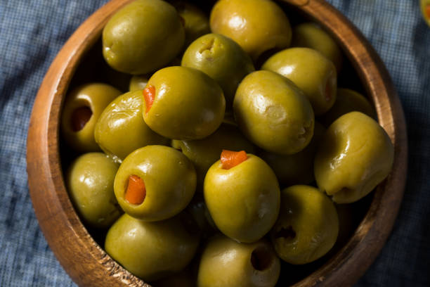 istock Organic Green Canned Pimento Olives 1256747571