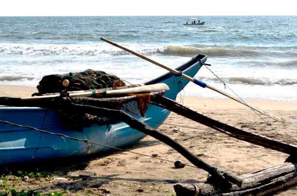 istock A Fishing Boat on the beach. 1256750349