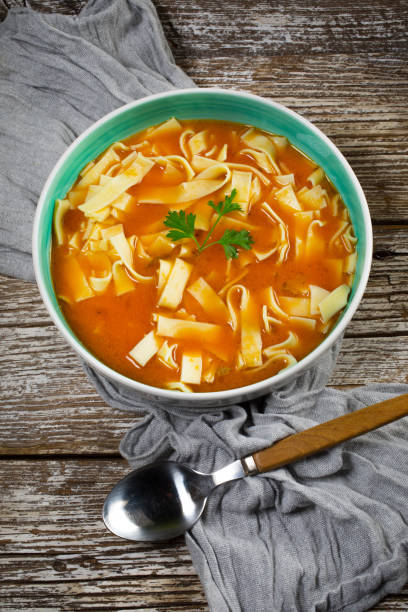 istock Tomato soup with noodles in a bowl. 1256750573