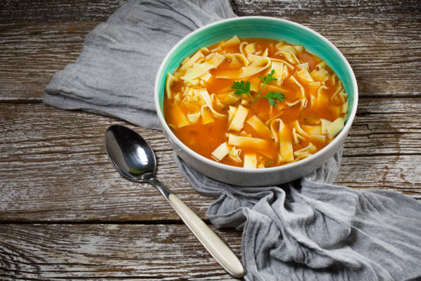 istock Tomato soup with noodles in a bowl. 1256750594