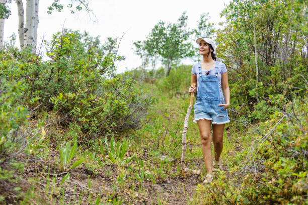 istock Millennial Female Enjoying and Solo Hiking in Mountain Setting 1256753205