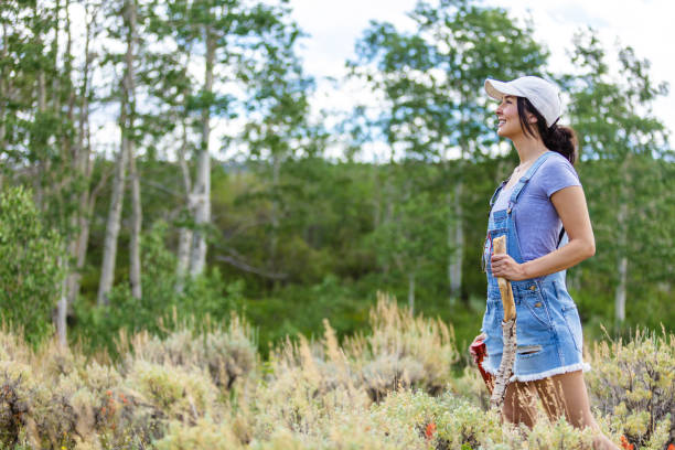 istock Millennial Female Enjoying and Solo Hiking in Mountain Setting 1256753206