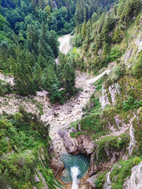 istock Waterfalls at the Neuschwanstein castle, Germany 1256754321