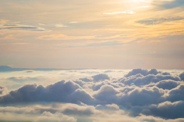 istock View at sunrise with puffy foggy. 1256756396