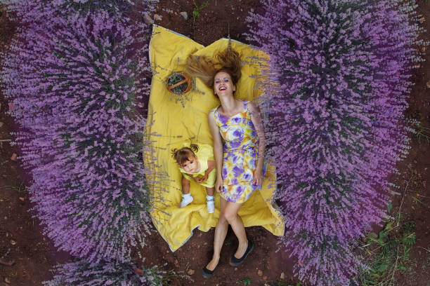 Mother with daughter in a lavender field