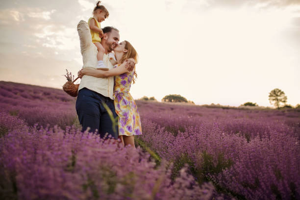 istock Young family in a lavender field 1256757539
