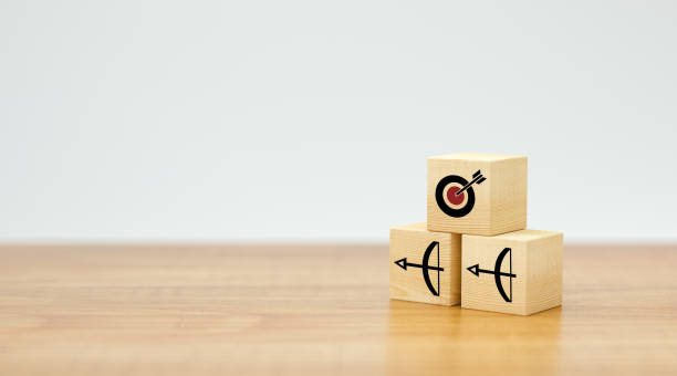 istock stacked cubes with arrow symbols pointing towards a target - 3d illustration 1256759738