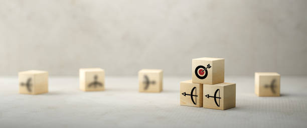 istock stacked cubes with arrow symbols pointing towards a target - 3d illustration 1256759826