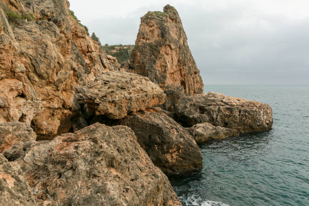 istock Cliffs of cliffs by the sea in Turkey / Antalya 1256762627