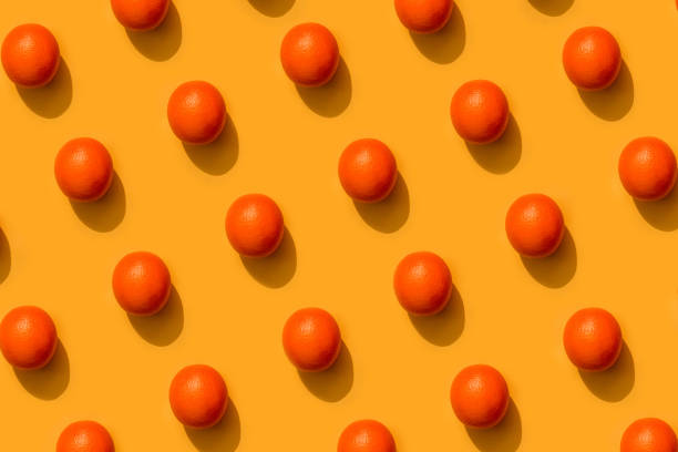 istock colorful tomato pattern on a colorful background top view 1256766243