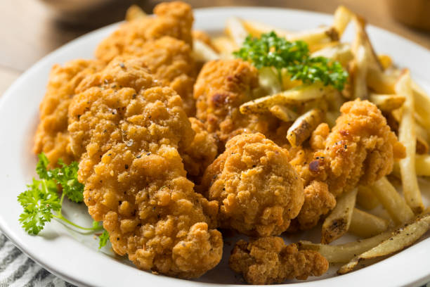 istock Deep Fried Chicken Tenders and Fries 1256767187