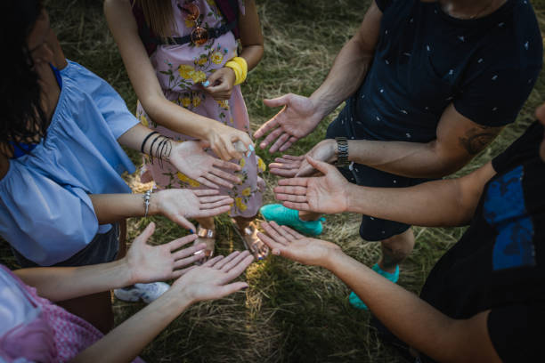 istock Volunteers using hand sanitizer after cleaning riverbank from garbage 1256769828
