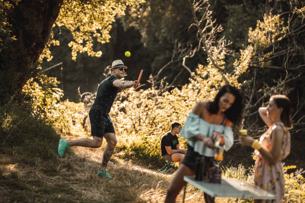 istock Men's playing tennis on picnic 1256770869