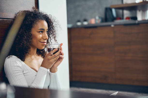 istock Pretty lady in a sweater looking away 1256771753