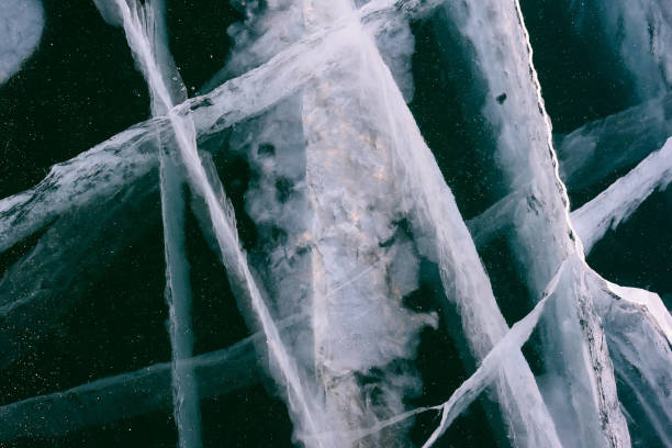 istock Beautiful ice of Lake Baikal with abstract cracks 1256772648