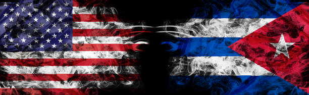 United States and Cuban crisis with mystic flags American flag and Cuban flag in smoke on black. Concept of world conflict and war. America VS Cuba business metaphor. Dollar Pesos exchange currency, international commercial tension. 3D illustration. cuba market stock pictures, royalty-free photos & images