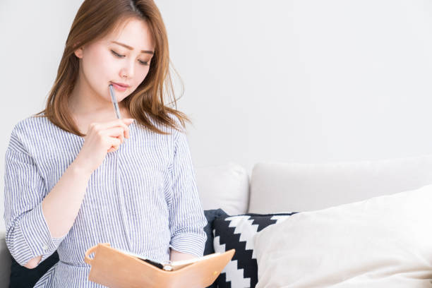istock asian women ,schedule book 1256779922