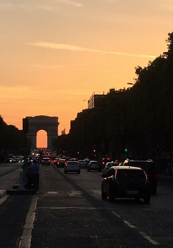 The famous Arc de Triomphe on the Place Charles de Gaulle at dusk