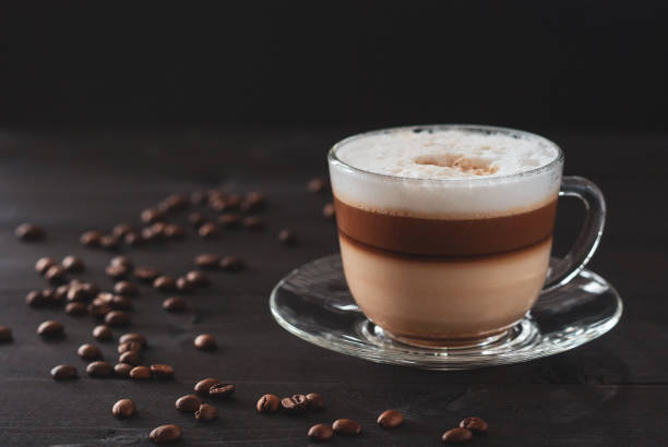 istock Cup of coffe on a dark background 1256801152