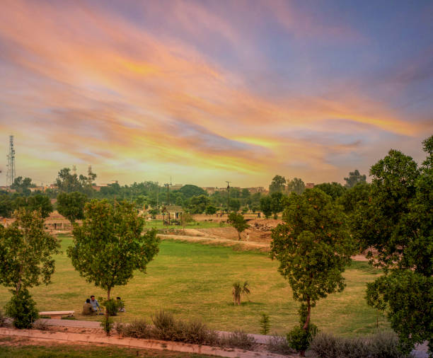 romantic and lovely sunset on kaleem shaheed park faisalabad