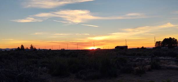 istock Sunset silleoutte over the high desert 1256802748