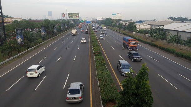 Tangerang Highway Tangerang Indonesia Highway in the morning tangerang photos stock pictures, royalty-free photos & images