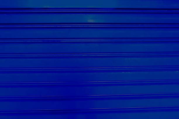 istock Background Textured of Blue Corrugated Metal Sheet 1256810248