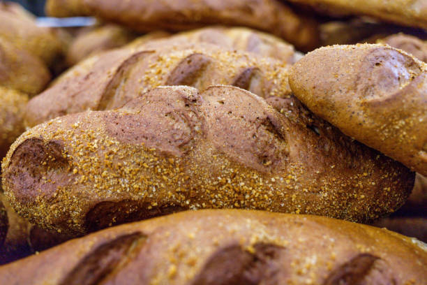 istock a few freshly baked bread rolls lie in front of the camera 1256812141