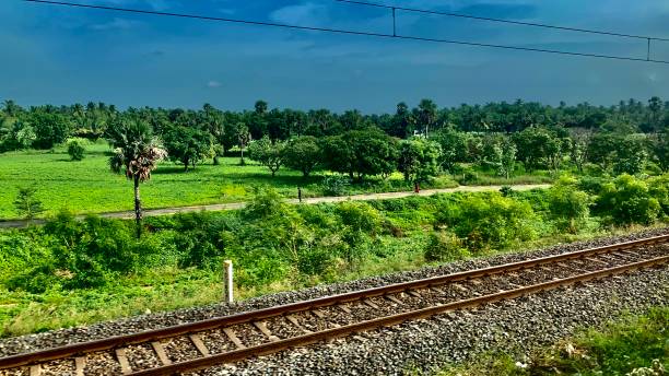istock Railway tracks running through the village 1256816825