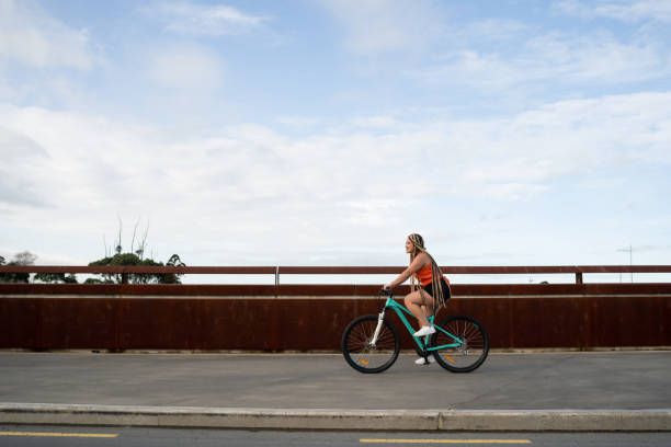 istock Young woman on bike. 1256820240