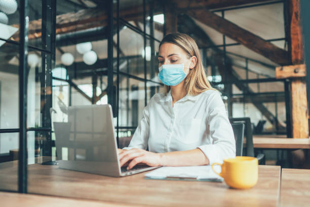 istock Business woman at office 1256824136