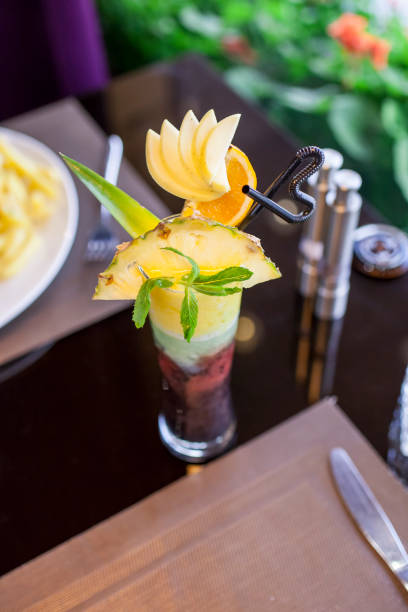Colorful delicious smoothie designed by fruit slides