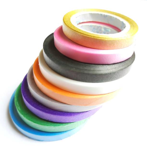 istock Multi colored curling ribbon arranged in diagonal shape beautifully in white chart as backgrounds 1256836033