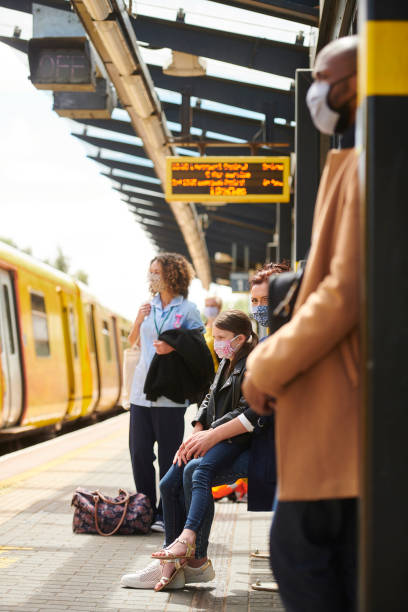 istock social distancing train travel 1256837410
