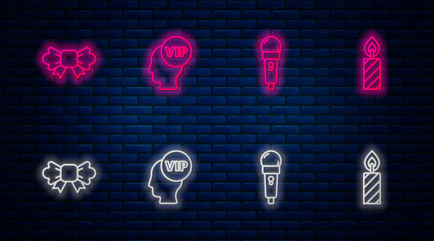 istock Set line Vip inside head, Microphone, Bow tie and Birthday cake candles. Glowing neon icon on brick wall. Vector 1256837581