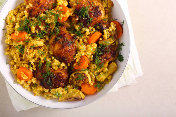 istock thighs with zucchini, carrot and bulgur 1256848258