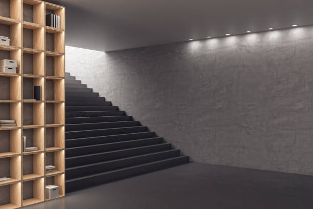 istock Modern loft office room with wooden bookcase 1256850273