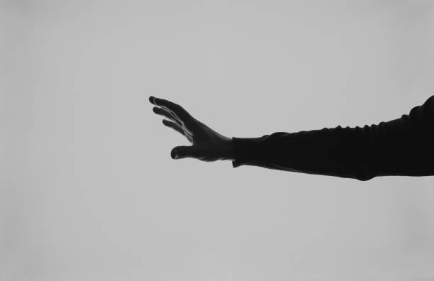 istock Hand emotion silhouette black and white 1256850630