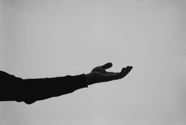 istock Hand emotion silhouette black and white 1256850664