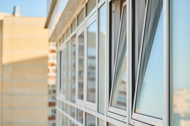 istock PVC windows on facade of skyscraper 1256851368